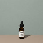 Hudson Made co beard and shave oil juniper myrrh in a 30ml amber rounded glass bottle with a glass dropper cap and a white label