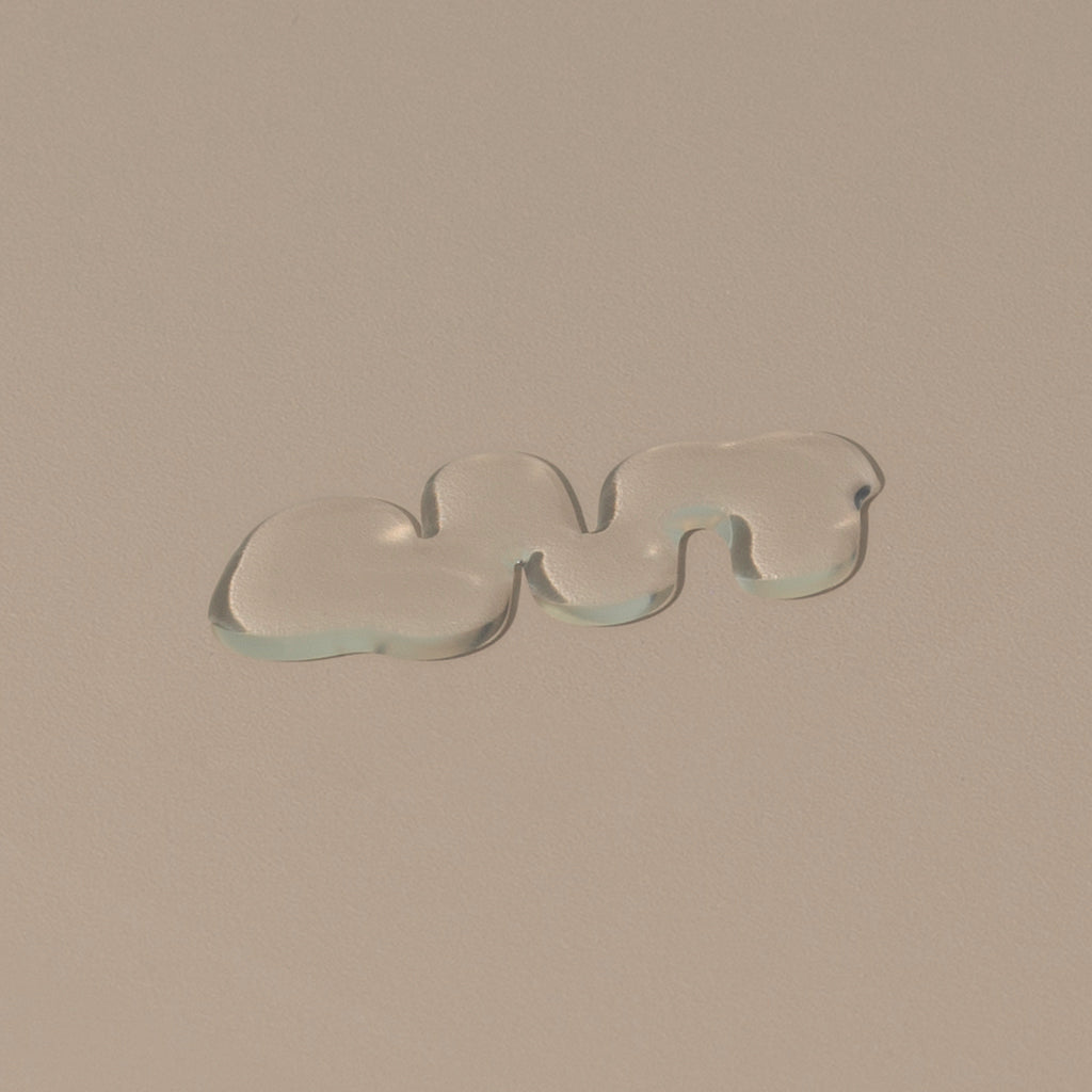 Hudson Made co morning shift body wash transparent shower gel liquid dropped on a table