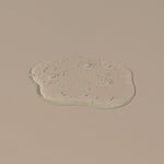 Hudson Made co morning shift hand soap transparent hand gel liquid dropped on a table