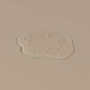 Hudson Made co morning shift hand soap transparent hand gel liquid dropped on a table