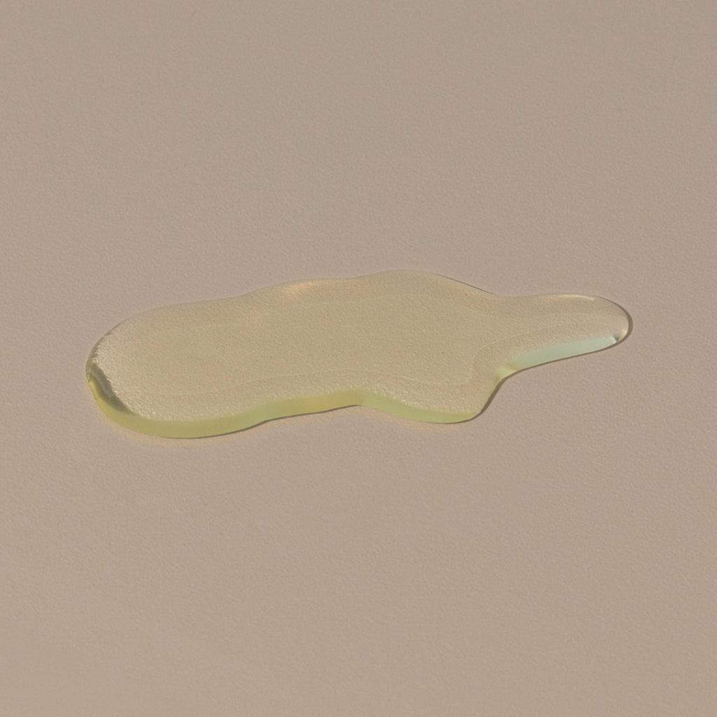 Juniper Ridge desert cedar body wash in a transparent gel spread on a table