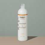 Oneka goldenseal and citrus organic conditionner in a long cylindric clear white plastic bottle with a press cap and white and orange labeling