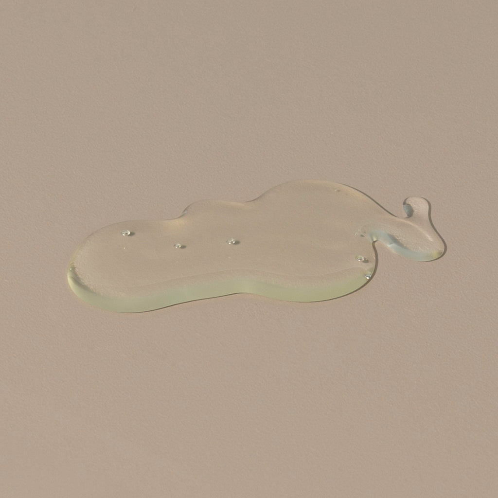Oneka goldenseal and citrus transparent jelly organic shampoo spread on the table
