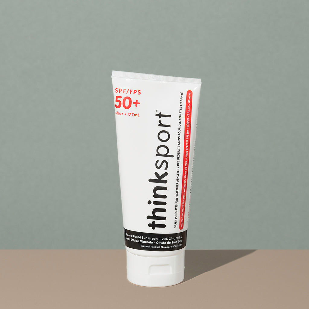 Thinksport 50+ FPS 6oz sunscreen in a white plastic tube with flip dispenser cap and black and red writings