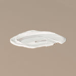 Thinksport 50+ FPS sunscreen white creamy texture spread on a table