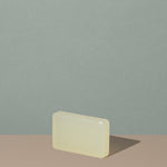 Off white beige rectangular soap bar of The Unscented Company biodegradable Soap Bar out of the box 