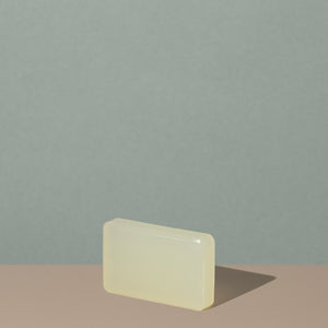 Off white beige rectangular soap bar of The Unscented Company biodegradable Soap Bar out of the box 