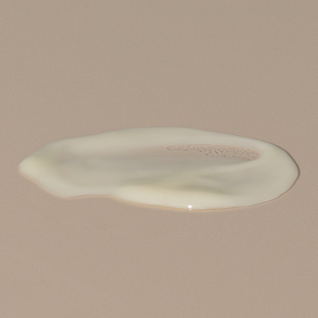 Ursa Major Fortifying Face Balm creamy off white stain spread on a table