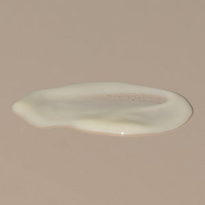 Ursa Major Fortifying Face Balm creamy off white stain spread on a table